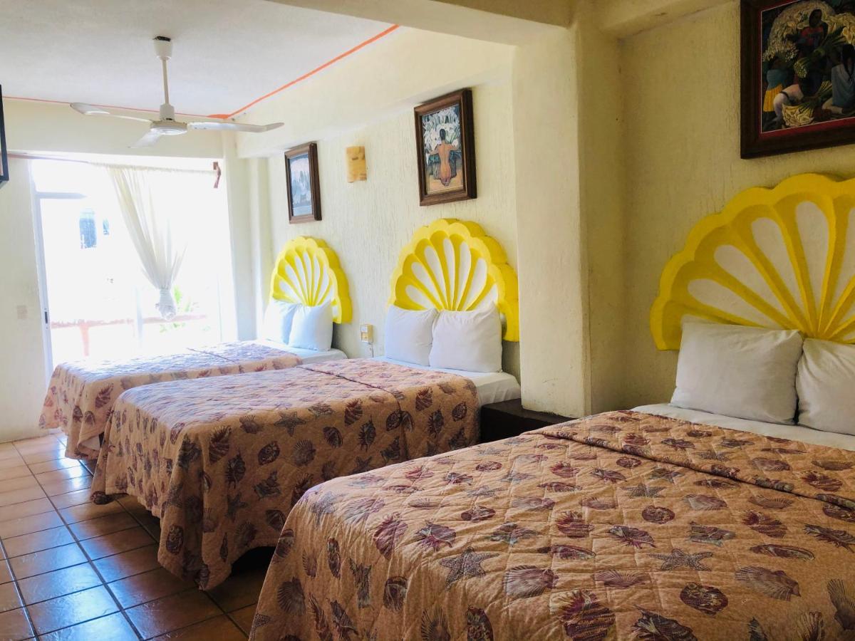 Hotel Playa Santa Cruz By Rotamundos Huatulco Esterno foto