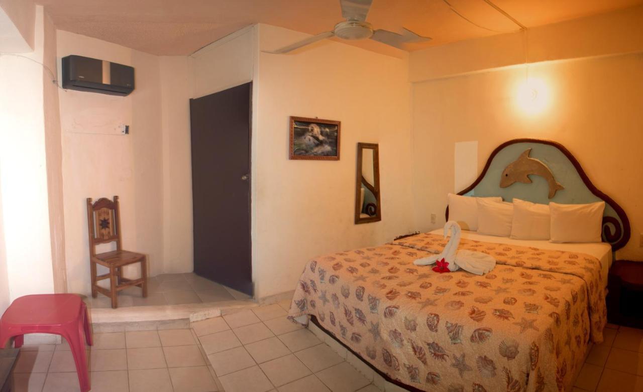 Hotel Playa Santa Cruz By Rotamundos Huatulco Esterno foto
