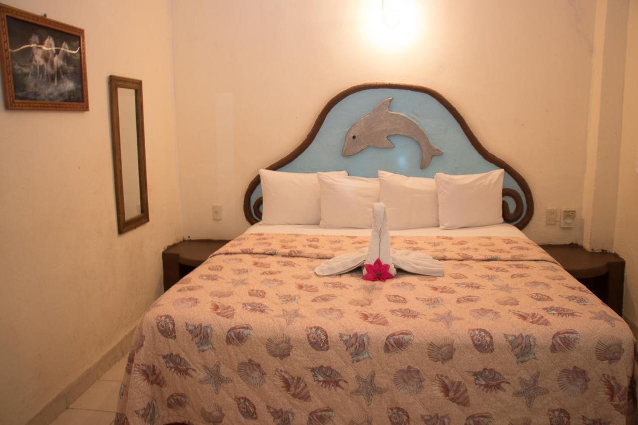 Hotel Playa Santa Cruz By Rotamundos Huatulco Esterno foto